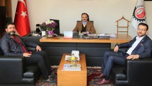 SAĞLIK-SEN'DEN BAŞKAN CAHAN'A TEŞEKKÜR PLAKETİ