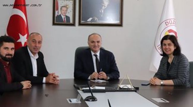İGM VE MHP HEYETİNDEN BAŞKAN ÖZLÜYE ZİYARET