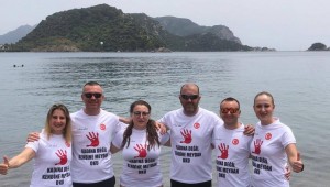 KULAÇLAR KADINA ŞİDDETE KARŞI