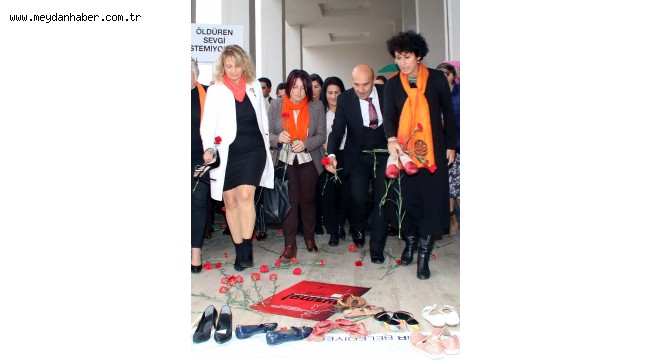 İKKB, kadına şiddete dikkat çekmek için ayakkabı bıraktı Kadına şiddette İzmirliler tek yürek