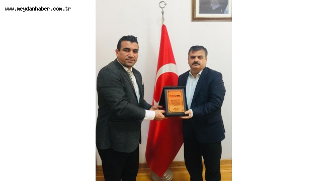TURGAY ESEN'E MEYDAN HABER AİLESİNDEN ANLAMLI ÖDÜL