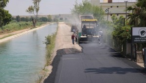 Adana'da asfaltsız yol bırakmamak için yoğun çalışıyor