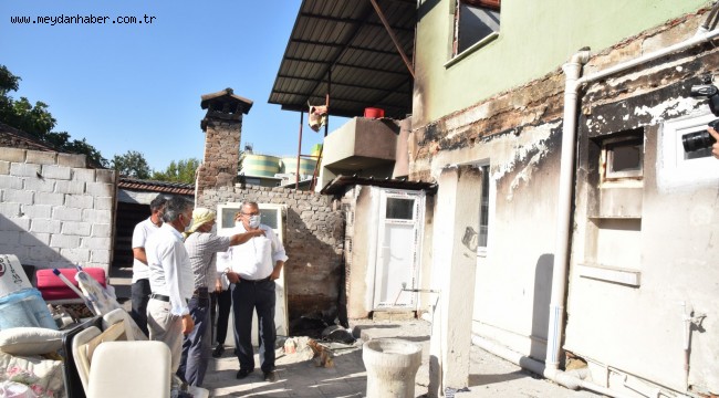 EVİ YANAN İKİ AİLEYE YUNUSEMRE SAHİP ÇIKTI