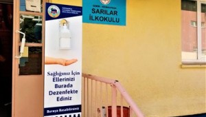 Kemapaşa Belediyesi'nden okullara ve duraklara dezenfektan standı