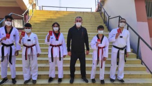 YUNUSEMRELİ 5 TAEKWONDOCU SİYAH KUŞAĞA TERFİ ETTİ