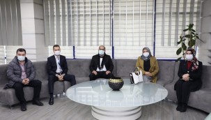 BAŞKAN ÖZLÜ, MHP İL TEŞKİLATINI AĞIRLADI