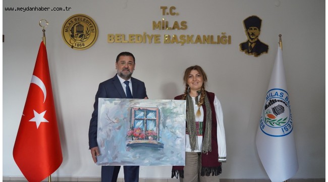 BAŞKAN TOKAT'A ANLAMLI HEDİYE