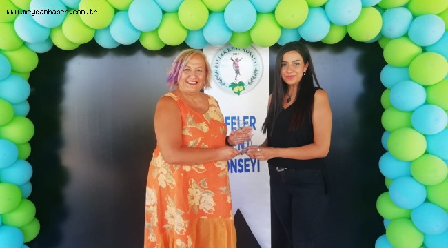 PERİHAN YILDIRIM'DAN ERGÜNOĞLU'NA TEŞEKKÜR PLAKETİ