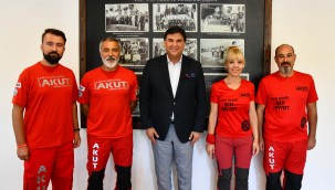 Karaca AKUT ile görüştü