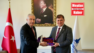 TÜRKMEN'DEN CEMİL TUGAY'A ZİYARET